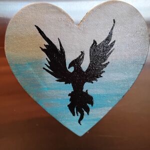 Heart-Shaped Magnit  Art with Black Phoenix Design